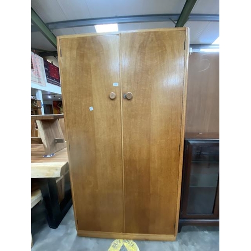 147 - Mid century teak Herbert E Gibbs wardrobe with shelves and hanging rail to the interior 183H 102W 42... 