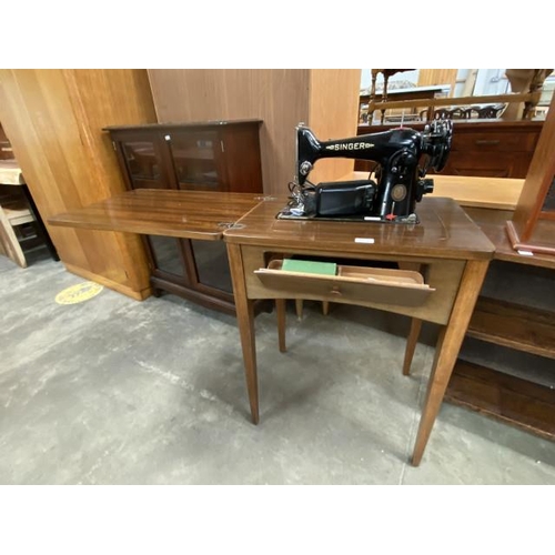 149 - Singer EJ133917 sewing machine with foot pedal and sewing table (dates to 1953) 78H 59W 42D