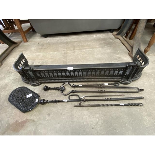 160 - Black cast fender 104W, fire irons and trivet