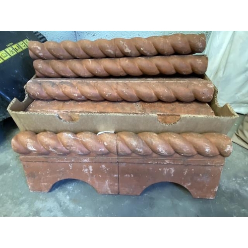 19 - 12 Terracotta rope edging tiles 17H 47W (as found)