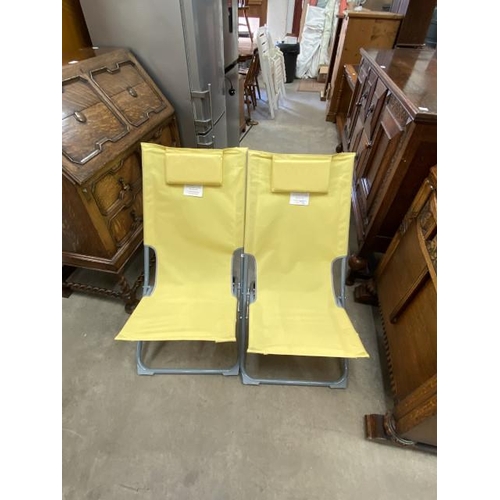 206 - 2 folding garden chairs