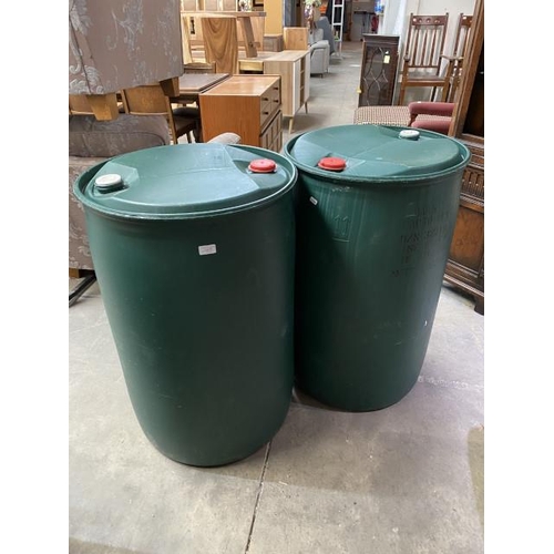 31 - 2 plastic oil drums 93H 59cm diameter