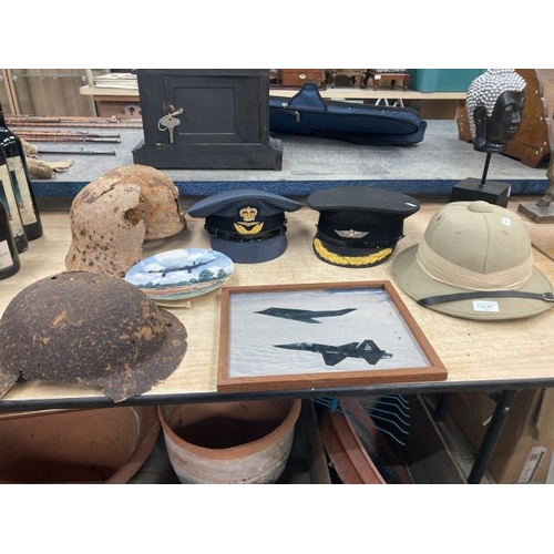 407 - Collection of uniform hats including RAF officers hat, pilot's hat, pith helmet, WWI/WWII British an... 