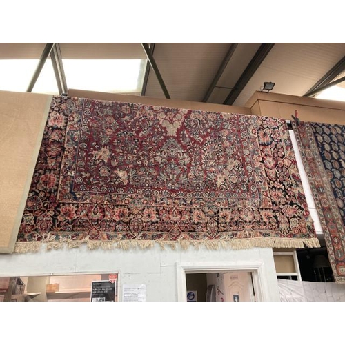 427 - Red ground Persian rug 440 x 315cm (as found)