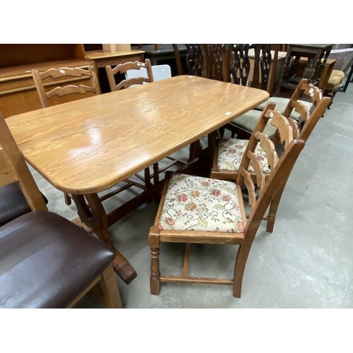 50 - Oak refectory table 75H 140W 76D and 4 ladderback chairs