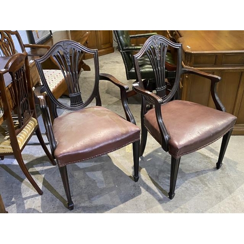 82 - 2 19th century mahogany, leather seated armchairs 58W