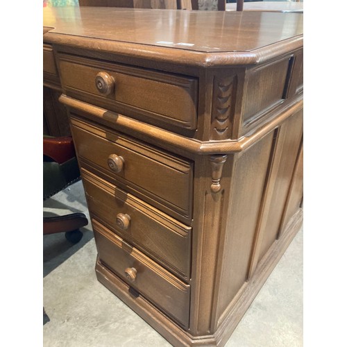 60 - A limited edition Ercol elm 'Roxburghe Desk', number 192 of 250 with brass plaque to inside drawer a... 