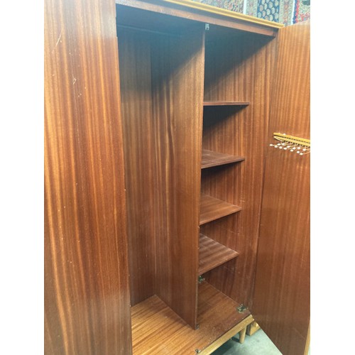 143 - Mid century ‘Meredew’ wardrobe, with shelves and hanging rail to the interior 182H 91W 55D , a match... 