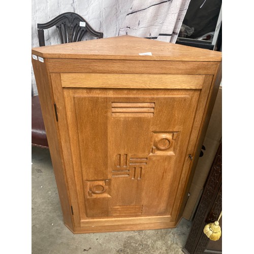 70 - Art Deco French oak corner cupboard (possibly by Charles Dudouyt) with one key 89H 64W 38D