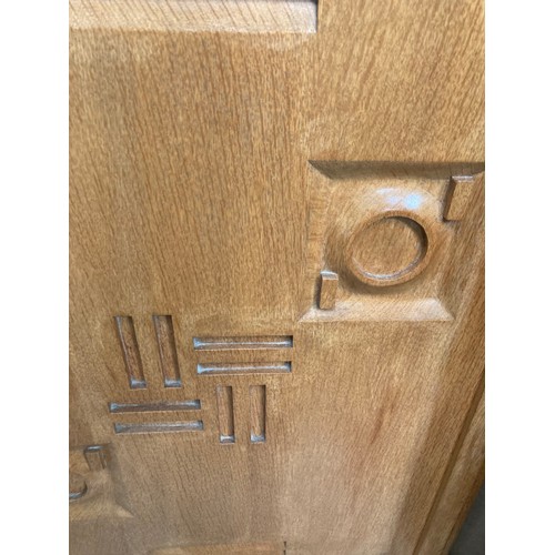 70 - Art Deco French oak corner cupboard (possibly by Charles Dudouyt) with one key 89H 64W 38D