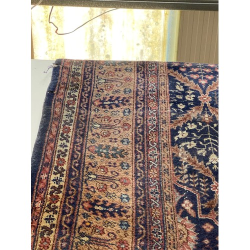 419 - Antique Persian carpet (worn in places/ tears, sold as seen) 390 x 320cm