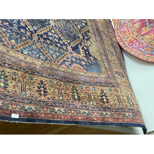 419 - Antique Persian carpet (worn in places/ tears, sold as seen) 390 x 320cm