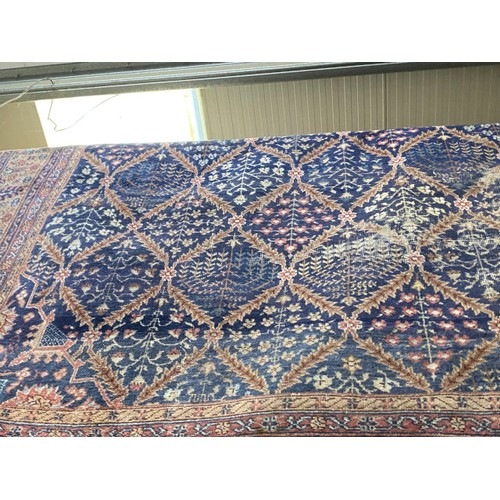 419 - Antique Persian carpet (worn in places/ tears, sold as seen) 390 x 320cm