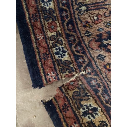 419 - Antique Persian carpet (worn in places/ tears, sold as seen) 390 x 320cm