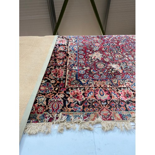 427 - Red ground Persian rug 440 x 315cm (as found)