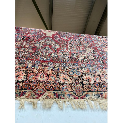 427 - Red ground Persian rug 440 x 315cm (as found)