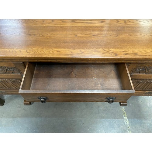 122 - Old Charm oak sideboard 82H 162W 45D and Old Charm oak draw leaf table 77H 137-214W 82D and 4 oak li... 