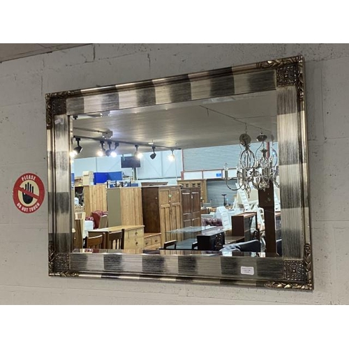 124 - Silver gilt framed bevel edged mirror 65 x 91cm