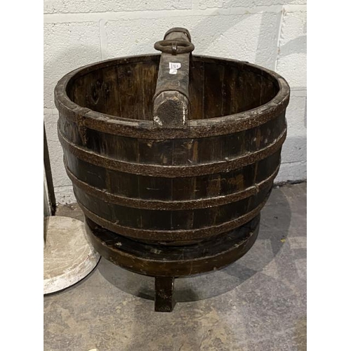 127 - Oriental oak well bucket and stand 51H 50cm diameter