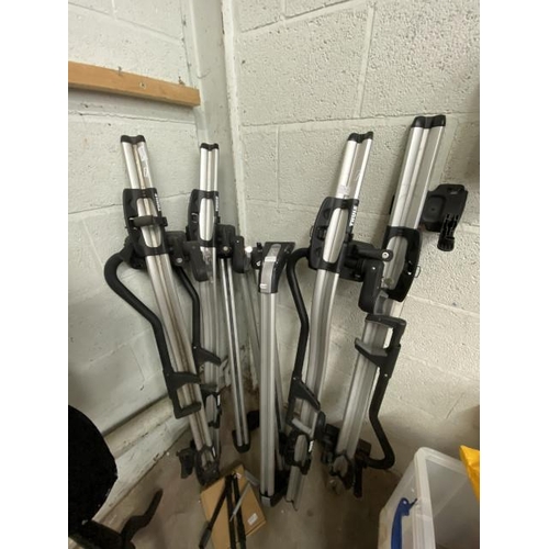 13 - 4 Thule roof bike racks and 2 pairs of Mini car roof racks (keys with one pair)