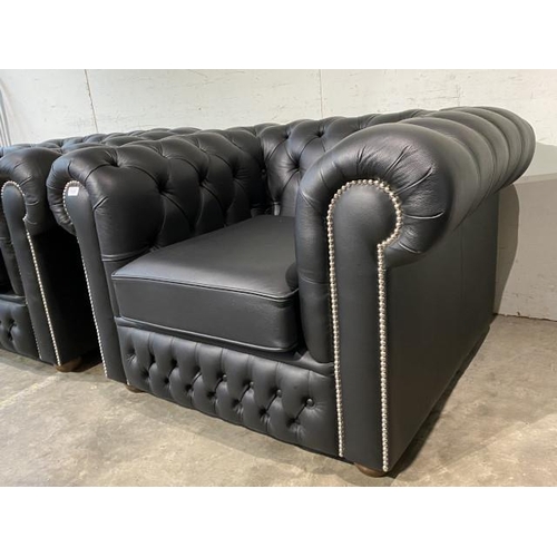 146 - Hand made black leather button back Chesterfield club chair 68H 107W 95D (in excellent condition)