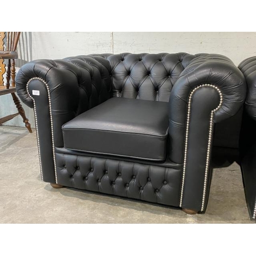 147 - Hand made black leather button back Chesterfield club chair 68H 107W 95D (in excellent condition)