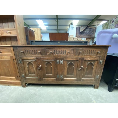 166 - Oak sideboard with 3 drawers and 4 doors 81H 152W 42D