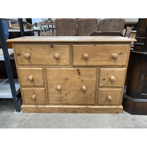 201 - Pine multi drawer chest 76H 109W 40D