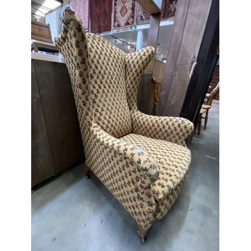 24 - Georgian upholstered wing armchair 76W