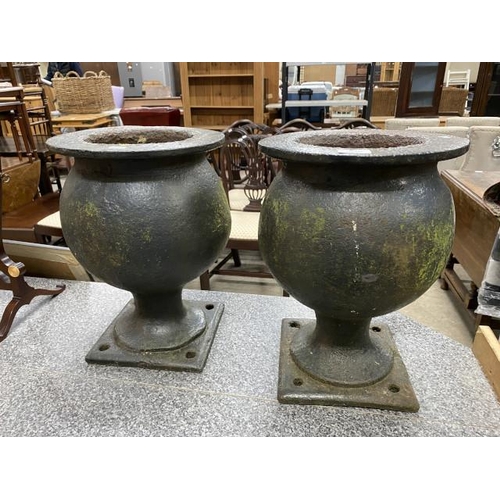 257 - Pair of Victorian cast iron planters 42H 30cm diameter