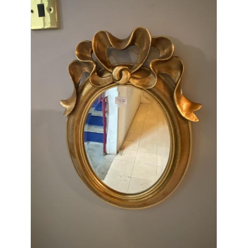 288 - Gilt oval framed mirror 60H 30W