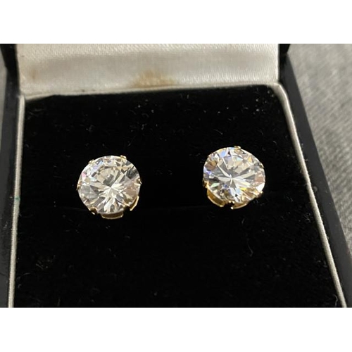 340 - Pair of 9ct gold solitaire stud earrings