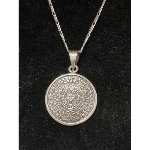 409 - Silver Oma Mexican Mayan calendar pendant on silver neck chain, 62cm long