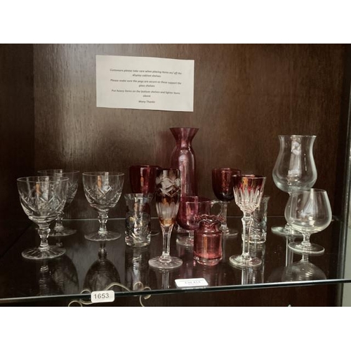 414 - Shelf of glass inc. 5 pieces of cranberry, pair of iridescent mosaic style glasses, Nachtmann crysta... 