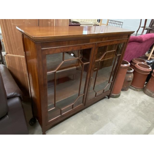 83 - Edwardian Jones, Moss & Co mahogany glazed bookcase with one key 107H 122W 37D