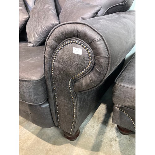 131 - Grey/black suede settee with button back detail 90H 220W 102D and a matching footstool 45H 102W 70D ... 