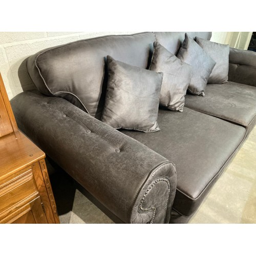 131 - Grey/black suede settee with button back detail 90H 220W 102D and a matching footstool 45H 102W 70D ... 