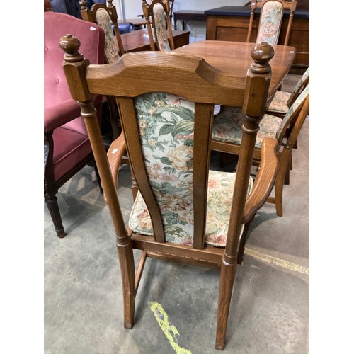 117 - Ercol ‘Hampton’ elm dining table 74H 161W 92D and 6 chairs including one carver