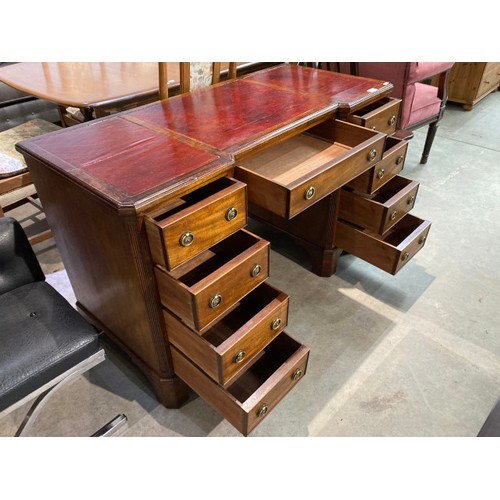 120 - 19th century mahogany with red leather inset kneehole desk 77H 121W 54D