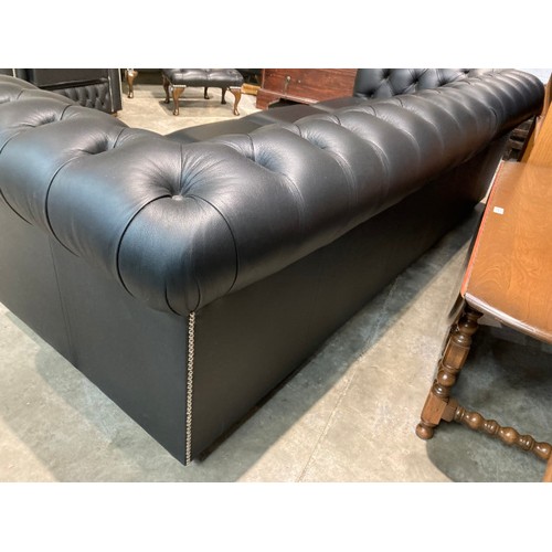 144 - Hand made black leather button back Chesterfield 4 seat settee 70H 235W 92D (in excellent condition)