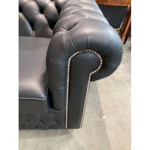 144 - Hand made black leather button back Chesterfield 4 seat settee 70H 235W 92D (in excellent condition)