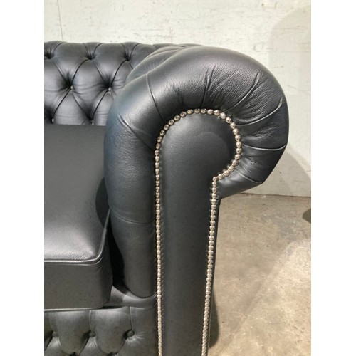 146 - Hand made black leather button back Chesterfield club chair 68H 107W 95D (in excellent condition)