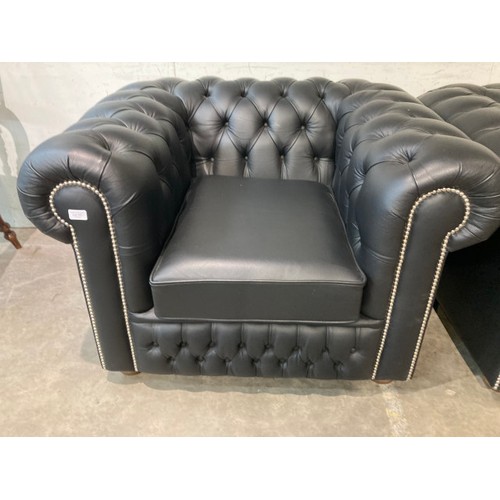 147 - Hand made black leather button back Chesterfield club chair 68H 107W 95D (in excellent condition)