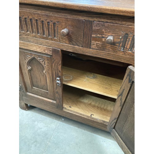 166 - Oak sideboard with 3 drawers and 4 doors 81H 152W 42D