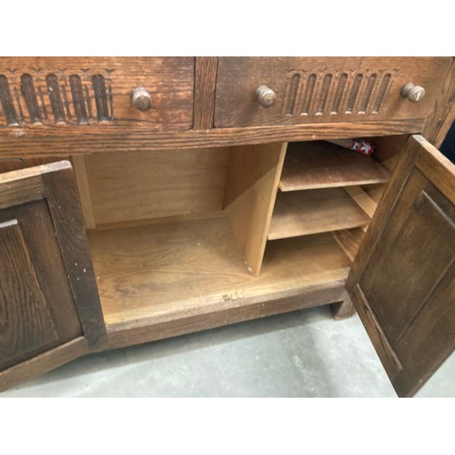 166 - Oak sideboard with 3 drawers and 4 doors 81H 152W 42D