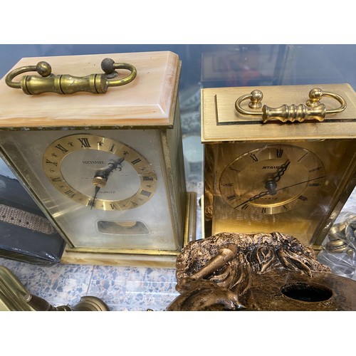 432 - 2 boxes of brassware, Smiths Enfield Bakelite mantel clock, table bell, two 18th/19th century gun po... 