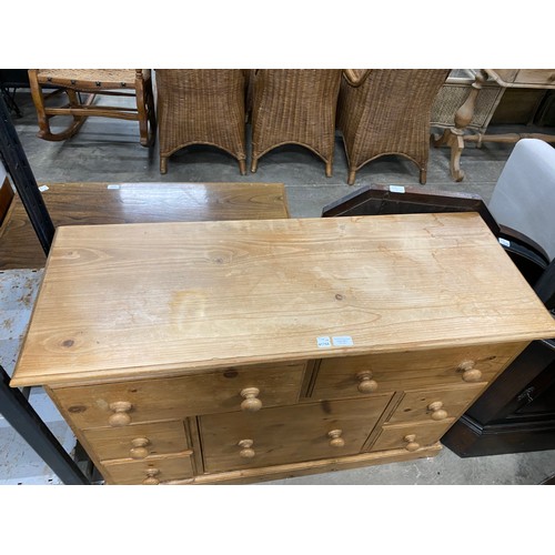 201 - Pine multi drawer chest 76H 109W 40D