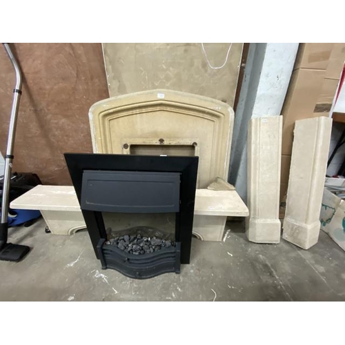 10 - Stone effect fire surround and an electric fire 107cm x 130cm as found