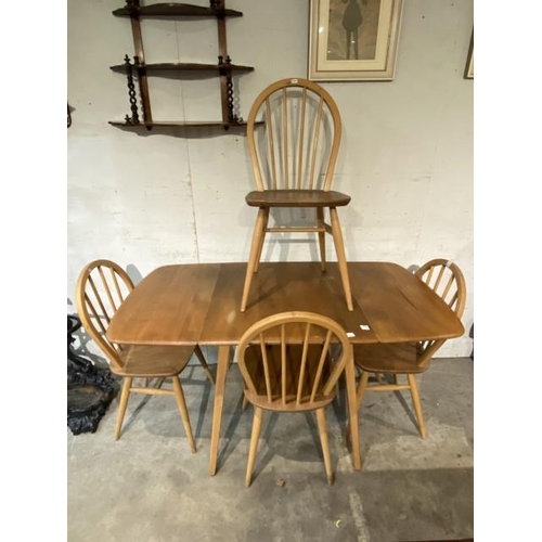 119 - Mid century blond elm Ercol drop leaf table 72H 65-139W 74D and 4 hoop back chairs