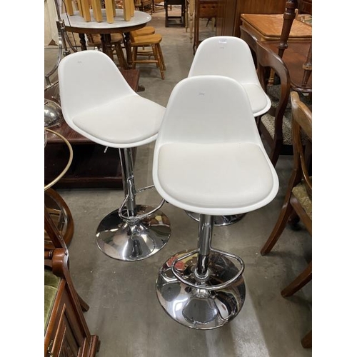 124 - 3 chrome based swivel bar stools